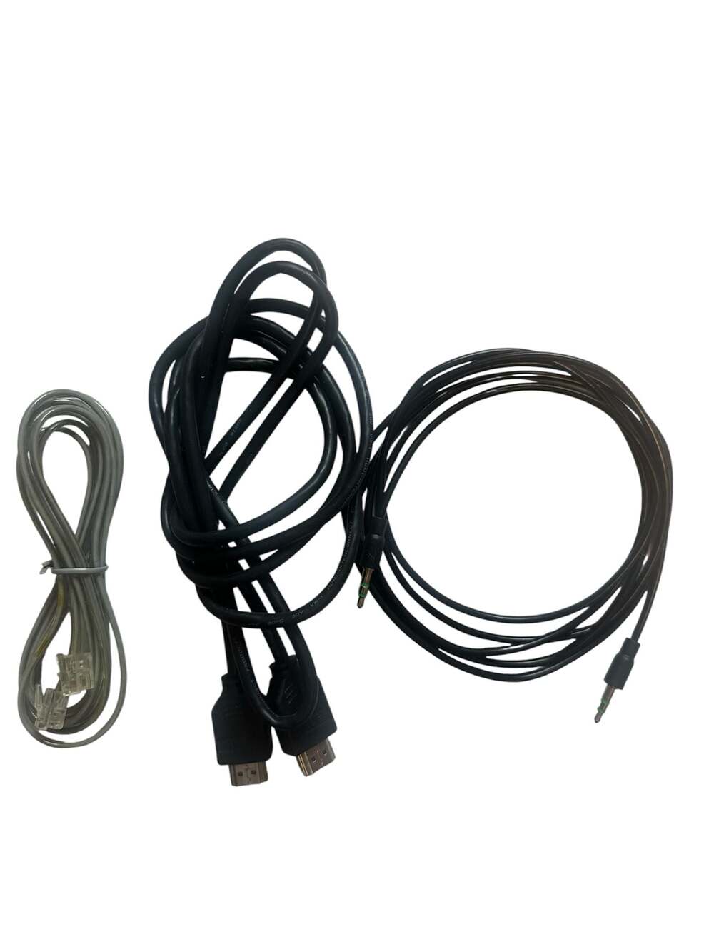 Assorted Electronic Cables Bundle: HDMI Cable, 3.5mm Stereo Audio Cable, and Tel